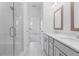 Modern bathroom featuring double sinks, tiled shower, and elegant finishes at 344 Olmstead Way # 32, Alpharetta, GA 30022