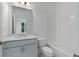 Well-lit bathroom with single vanity, tub-shower combo, and modern fixtures at 344 Olmstead Way # 32, Alpharetta, GA 30022