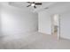 Spacious bedroom with carpet, trey ceiling with fan, and access to an en-suite bathroom at 344 Olmstead Way # 32, Alpharetta, GA 30022