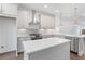 Modern kitchen with stainless steel appliances, white cabinets, and quartz countertops at 344 Olmstead Way # 32, Alpharetta, GA 30022