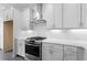 Bright kitchen with stainless steel appliances, white cabinets, and granite countertops at 344 Olmstead Way # 32, Alpharetta, GA 30022