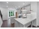Modern kitchen featuring a large island, stainless steel appliances, and ample cabinet space, creating a chef's dream at 344 Olmstead Way # 32, Alpharetta, GA 30022