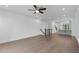 Spacious living room with hardwood floors, recessed lighting, and an open layout, perfect for entertaining at 344 Olmstead Way # 32, Alpharetta, GA 30022