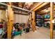 Unfinished basement with exposed ceiling, storage shelves and concrete foundation walls at 4425 Martel Dr, Cumming, GA 30040