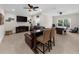 Spacious game room featuring a bar-top seating area, TV, and air hockey table at 4425 Martel Dr, Cumming, GA 30040