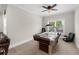 Game room with an air hockey table, fan and black chair at 4425 Martel Dr, Cumming, GA 30040