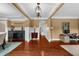 Elegant living room with beautiful hardwood floors and designer decor at 4425 Martel Dr, Cumming, GA 30040