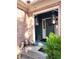 Inviting front entrance with decorative lanterns and charming dog statues at 6340 Koweta Rd, Fairburn, GA 30213