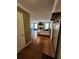 Spacious living room with hardwood floors, fireplace, and abundant natural light at 6340 Koweta Rd, Fairburn, GA 30213