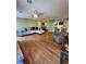 Comfortable living area with hardwood floors, neutral tones, and a ceiling fan at 6340 Koweta Rd, Fairburn, GA 30213