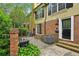 Charming brick townhouse featuring a small, fenced front patio at 1634 Ponce De Leon Ne Ave # 514, Atlanta, GA 30307