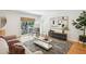 Bright living room with hardwood floors and large windows at 1634 Ponce De Leon Ne Ave # 514, Atlanta, GA 30307