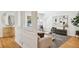 Open-concept living room with wood floors and stylish furnishings at 1634 Ponce De Leon Ne Ave # 514, Atlanta, GA 30307