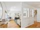 Bright open-concept living room with wood floors and stairs at 1634 Ponce De Leon Ne Ave # 514, Atlanta, GA 30307