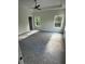 Spacious bedroom featuring new carpet, tray ceilings, and two large windows with scenic views at 1962 Compton Se Dr, Atlanta, GA 30315