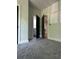 Neutral-toned bedroom with gray carpet and white trim details at 1962 Compton Se Dr, Atlanta, GA 30315
