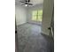 Bedroom with neutral paint, gray carpet and black ceiling fan at 1962 Compton Se Dr, Atlanta, GA 30315