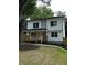 Charming two-story home with a cozy front porch and well-manicured lawn at 1962 Compton Se Dr, Atlanta, GA 30315