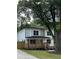 Lovely two-story home featuring a covered front porch and beautifully landscaped yard at 1962 Compton Se Dr, Atlanta, GA 30315
