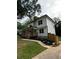 Stylish two-story home featuring a welcoming front porch and modern design elements at 1962 Compton Se Dr, Atlanta, GA 30315