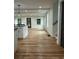 Bright kitchen with large island, granite countertops, modern fixtures, and hardwood floors at 1962 Compton Se Dr, Atlanta, GA 30315
