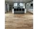 Open-concept design showcasing a modern kitchen with a stylish island and contemporary finishes at 1962 Compton Se Dr, Atlanta, GA 30315