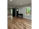 New hardwood floors and a modern ceiling fan make this open living space inviting at 1962 Compton Se Dr, Atlanta, GA 30315