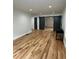 Spacious living room featuring beautiful hardwood floors and ample natural light at 1962 Compton Se Dr, Atlanta, GA 30315