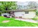 Backyard featuring a patio and green grass at 3133 Cottonwood Se Dr, Atlanta, GA 30316