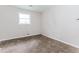 Bedroom with stained carpet and dirty walls at 3133 Cottonwood Se Dr, Atlanta, GA 30316