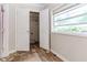 Bedroom with damaged flooring and a closet area at 3133 Cottonwood Se Dr, Atlanta, GA 30316