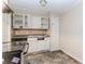 Kitchen featuring white cabinets and an oven at 3133 Cottonwood Se Dr, Atlanta, GA 30316
