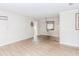 Spacious living room with laminate floors and a decorative mirror at 3133 Cottonwood Se Dr, Atlanta, GA 30316
