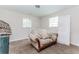 Living room featuring a loveseat and some stacked cushions at 3133 Cottonwood Se Dr, Atlanta, GA 30316