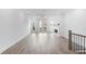 Bright living room with wood floors, fireplace, and access to outdoor balcony at 334 Olmstead Way # 37, Alpharetta, GA 30022