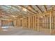Unfinished basement with stud framing and exposed ceiling with insulation at 1065 Low Water Crossing Nw, Acworth, GA 30101