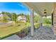 Exterior view of a home with stone accented porch, white columns, and black iron railings at 1065 Low Water Crossing Nw, Acworth, GA 30101