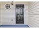 Close-up of the home's entry door with a charming exterior at 2183 Miranda Dr, Morrow, GA 30260