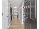 Inviting entrance hall with hardwood floors and a modern color scheme at 2183 Miranda Dr, Morrow, GA 30260