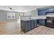 Modern kitchen with stainless steel appliances and an adjacent dining area at 2183 Miranda Dr, Morrow, GA 30260
