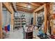 Unfinished basement space with shelving and ample storage at 245 River Laurel Way, Woodstock, GA 30188