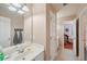 Bathroom featuring tile floors, large mirror, and a double-door cabinet at 245 River Laurel Way, Woodstock, GA 30188