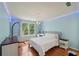 Bright bedroom with hardwood floors, and an accent light on the ceiling at 245 River Laurel Way, Woodstock, GA 30188