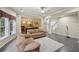 Spacious living room, with access to both the game room and staircase at 245 River Laurel Way, Woodstock, GA 30188