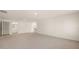 A spacious living room with adjacent bathroom at 2939 Champions Way, Loganville, GA 30052