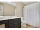 Bathroom boasts ample counter space, white towels, and large mirror at 4075 Hickory Fairway Dr, Woodstock, GA 30188