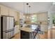 Spacious kitchen with a large island, stainless steel appliances, and a breakfast bar at 4075 Hickory Fairway Dr, Woodstock, GA 30188