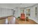 The spacious living room features hardwood floors, plenty of storage, and natural light from the large windows at 4075 Hickory Fairway Dr, Woodstock, GA 30188