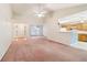 Open-concept layout with a seamless transition between the living room, dining area, and kitchen at 885 Falling Water Ln, Norcross, GA 30093