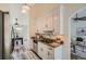 Updated kitchen featuring modern white cabinetry, stainless steel appliances, and granite countertops at 3290 Spincaster Way, Loganville, GA 30052